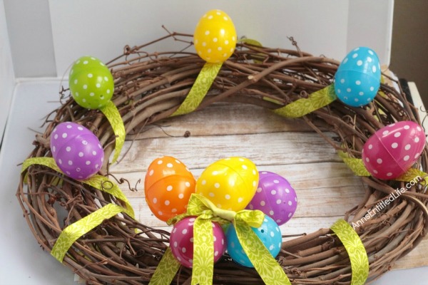 DIY Easter Egg Wreath. This Easter egg grapevine wreath is a wonderful spring door craft. This cute, simple to make, Easter egg wreath is an inexpensive Easter decoration, perfect decor for your door, over your fireplace or on a wall.