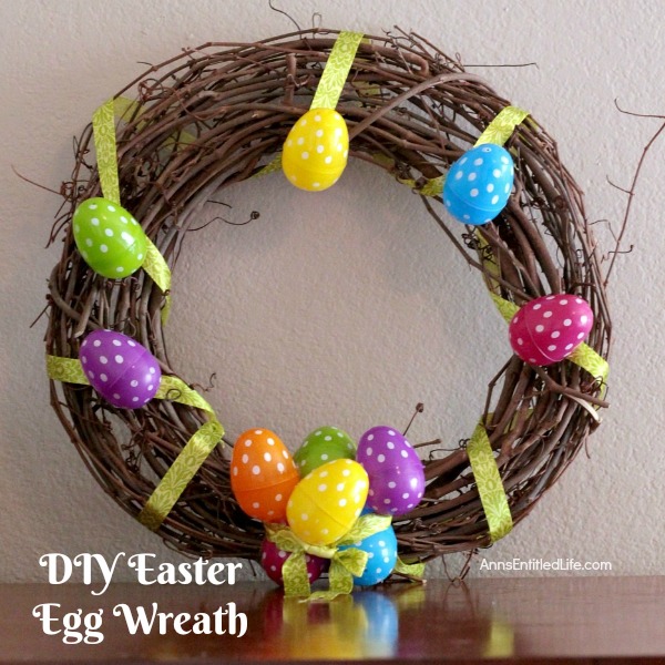 DIY Easter Egg Wreath. This Easter egg grapevine wreath is a wonderful spring door craft. This cute, simple to make, Easter egg wreath is an inexpensive Easter decoration, perfect decor for your door, over your fireplace or on a wall.