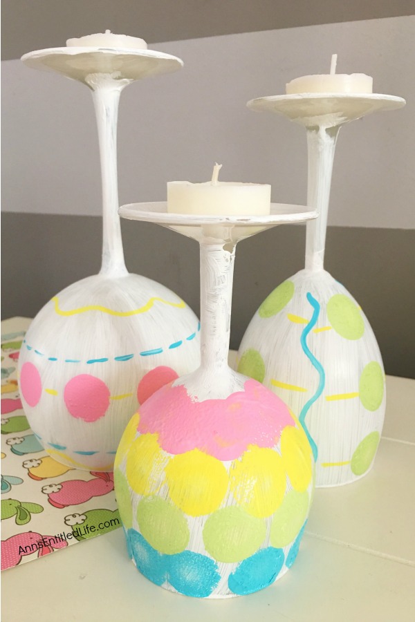 Easter Egg Wine Glass DIY. Make your own adorable Easter egg wine glasses! This easy step-by-step tutorial will show you how to easily make sweet Easter egg wine glass decor which is perfect for a centerpiece, mantel decor, or table decorations this Easter! This is an easy-to-make, delightful Easter season craft project.