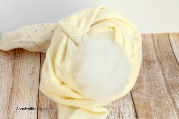 How to Make a Knot Pillow DIY Tutorial. You will not believe how simple it is to make this trendy pillow knot design. This knot pillow DIY version costs a whole lot less than a store bought pillow knot, and only takes about an hour to make.