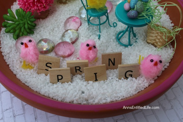 Spring Fairy Garden DIY Tutorial. This spring fairy garden is easy to put together. Great for tabletop decor, or for older children to play with under adult supervision, you and your children will have a lot of fun gathering your spring fairy garden supplies, and making your own personal miniature spring fairy garden this year!
