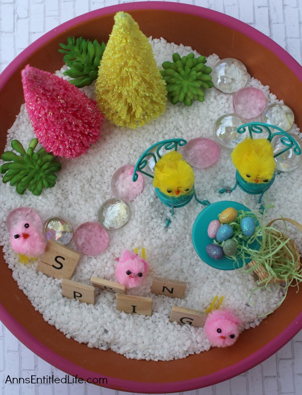 Spring Fairy Garden DIY Tutorial. This spring fairy garden is easy to put together. Great for tabletop decor, or for older children to play with under adult supervision, you and your children will have a lot of fun gathering your spring fairy garden supplies, and making your own personal miniature spring fairy garden this year!