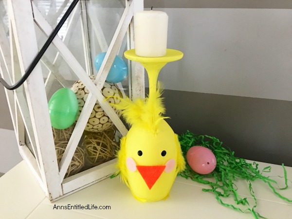 Yellow Chick Wineglass DIY. Make your own adorable Yellow Chick Wineglass. This easy step by step tutorial will show you how to easily make a sweet wineglass chickie which is perfect for a centerpiece, mantel decor or table decorations this Easter or spring! This is an easy to make, delightful spring craft project.