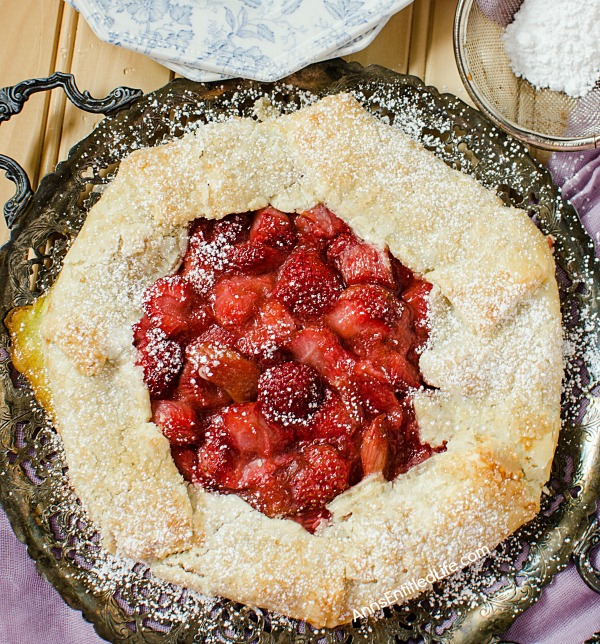 Strawberry Rhubarb Galette Recipe. Using fresh (or frozen) fruit, this pretty galette dessert is easy to make, but impressive to serve - not to mention super tasty! Make it for a treat tonight!