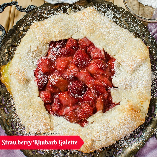 Strawberry Rhubarb Galette Recipe. Using fresh (or frozen) fruit, this pretty galette dessert is easy to make, but impressive to serve - not to mention super tasty! Make it for a treat tonight!