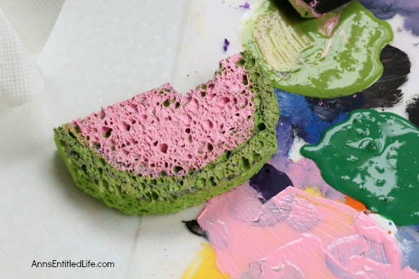 Watermelon Painted Napkins Craft. An easy, fun craft to make your own watermelon napkins using a sponge and acrylic paint! If you are looking for a fun summer napkin, a housewarming gift or shower present made with your own hands, this is it!