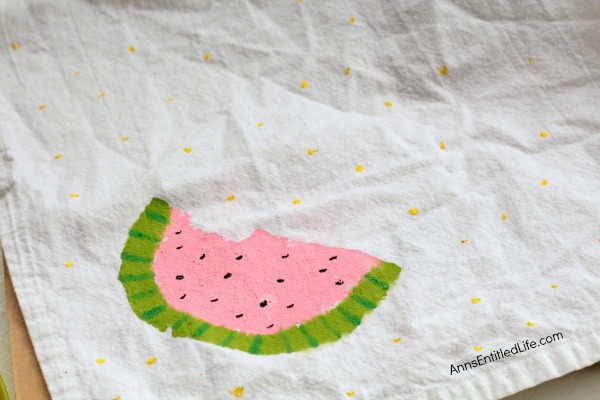 Watermelon Painted Napkins Craft. An easy, fun craft to make your own watermelon napkins using a sponge and acrylic paint! If you are looking for a fun summer napkin, a housewarming gift or shower present made with your own hands, this is it!