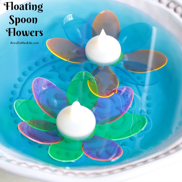 DIY Floating Spoon Flowers. Make your own floating flowers from plastic spoons! These simple to make floating flowers would be perfect to use at a wedding, summer party, in a backyard pool, or to light up in your backyard pond.