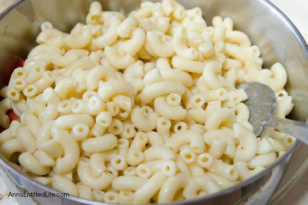 Herbed Cheese and Veggie Macaroni Salad Recipe. A new twist on an old favorite, this herbed cheese and vegetable recipe is simply delicious. An easy recipe to make, this summer side dish is a perfect accompaniment for backyard barbecues, picnics, lunches and evening meals.