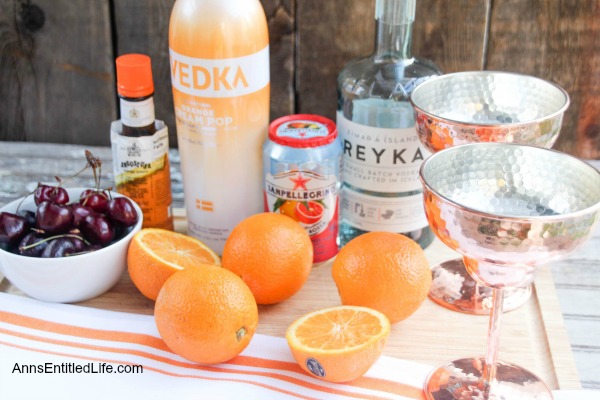 Orange Cooler Cocktail. A fresh, delicious cocktail bursting with orange flavor, this Orange Cooler will really hit the spot on a hot summer day. Try one this weekend!