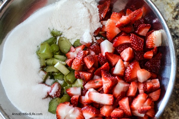 Strawberry Rhubarb Crisp Recipe. This updated, old time strawberry rhubarb crisp is simply delicious. The great sweet-tart taste of strawberries and rhubarb combined with a buttery good granola crumble topping makes for a dessert your entire family will enjoy!