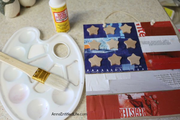 This DIY Decoupage American Flag Sign can be hung on your front door or inside your home or displayed on your patio for Independence Day - or anytime really since it is an 