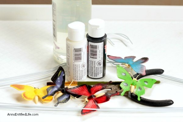 Easy DIY Butterfly Garden Markers. Simple to make garden markers to help you identify the fruits, vegetables, flowers, and herbs growing in your backyard or window garden. These are so easy to make, anyone can do it!