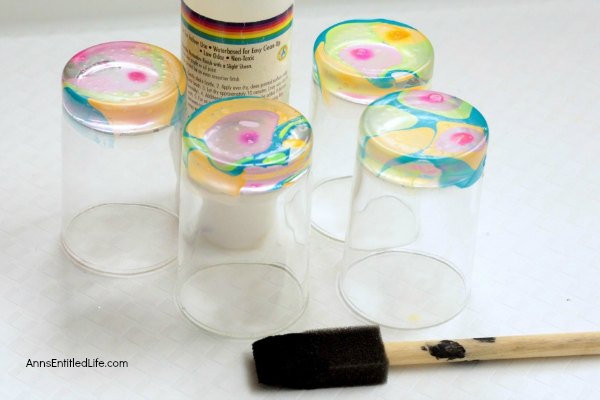 Nail Polish Painted Glasses DIY. These nail polish painted glasses are fun and easy to make. Since they are so unique, they make the perfect talking piece or a wonderful gift! Make a set and pair with a bottle of wine or liquor to give as a special birthday present, shower gift or housewarming gift! These interesting nail polish designs will be a popular gift with everyone.