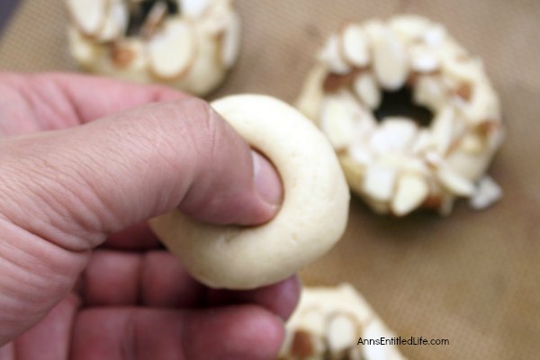 Almond Doughnut Cookies Recipe. Fun, easy to make cookies in the shape of a doughnut! These cookies are wonderful for packing in the old lunchbox, dessert or a cookie exchange!