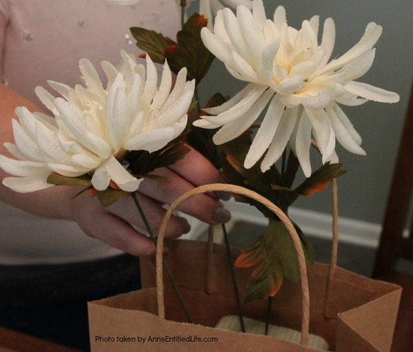 Dollar Store Craft: Paper Bag Flower Arrangement. This is an unusual, easy to make craft you can fabricate with basics found at your local dollar store. If you are looking for an inexpensive, quirky craft, you can make this paper bag flower arrangement in about 30 minutes using these step-by-step instructions.