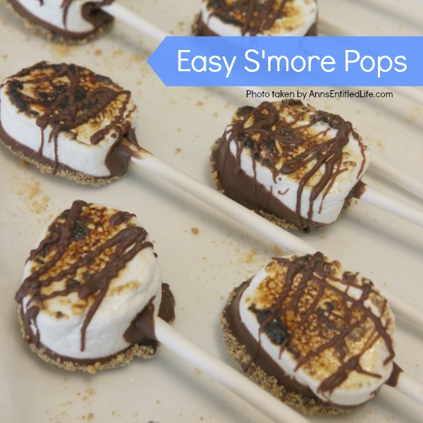 Easy S'mores Pops Recipe. You do not need a campfire to get the great taste of S'mores. Easy to make these delicious S'mores pops are made right in your kitchen in about 10 minutes. Great for parties and snacks, these fabulous S'mores Pops are a delightful treat the whole family will love!