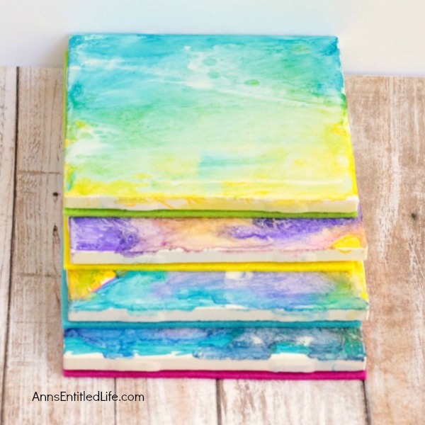 Tie Dye Coasters Tutorial. How to make your own tie dye coasters step by step tutorial. A fun, easy coaster craft perfect for home decor or as a housewarming gift!