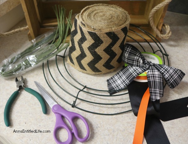 Halloween Burlap Wreath DIY. An easy to make Halloween wreath perfect to display over your fireplace, or on your front door.