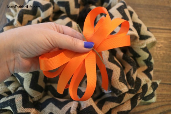 Halloween Burlap Wreath DIY. An easy to make Halloween wreath perfect to display over your fireplace, or on your front door.