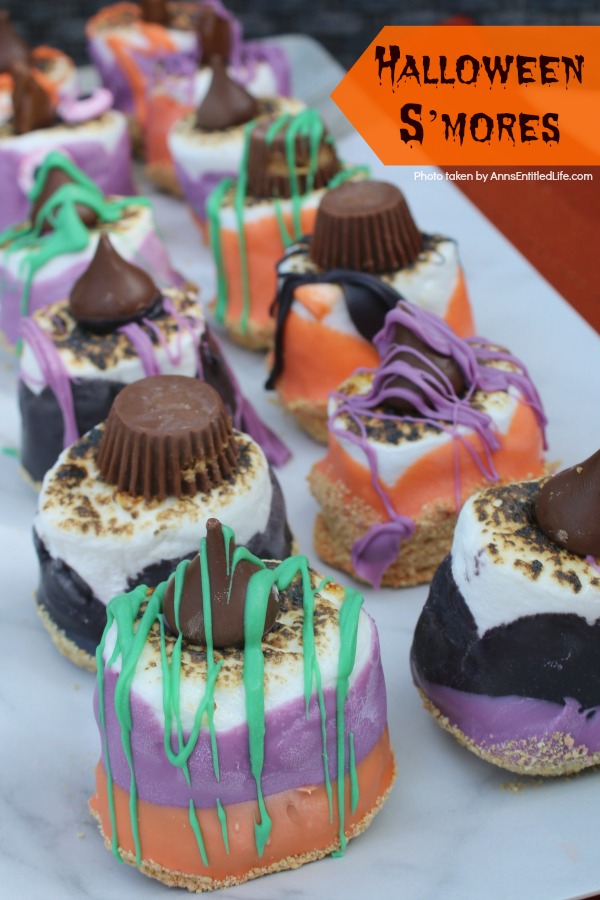 Easy Halloween S'mores Recipe. You do not need a campfire to get the great taste of S'mores. Make these delicious Halloween S'mores in your kitchen in about 10 minutes. Great for parties and snacks, these cute little Halloween s'mores are a simple sweet treat adults and children will love!