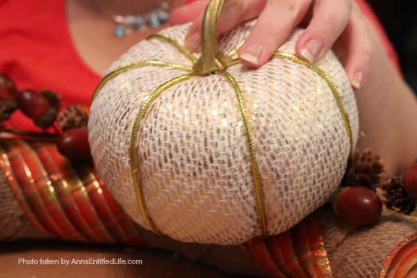 Rustic Fall Burlap Wreath DIY. This DIY tutorial on how to make a Rustic Fall Burlap Wreath has easy to follow, step-by-step instructions. Less than an hour or so of your time results in a lovely autumn wreath that is highly customizable, and a lot less expensive than a store bought wreath! Perfect fall decor for your front door. 