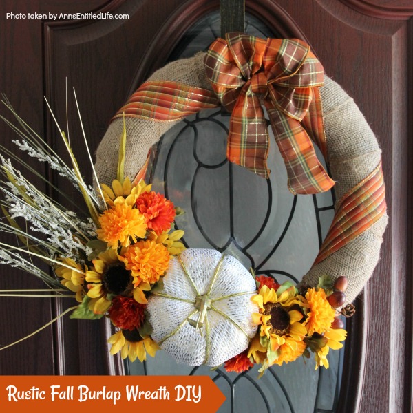 Rustic Fall Burlap Wreath DIY. This DIY tutorial on how to make a Rustic Fall Burlap Wreath has easy to follow, step-by-step instructions. Less than an hour or so of your time results in a lovely autumn wreath that is highly customizable, and a lot less expensive than a store bought wreath! Perfect fall decor for your front door. 