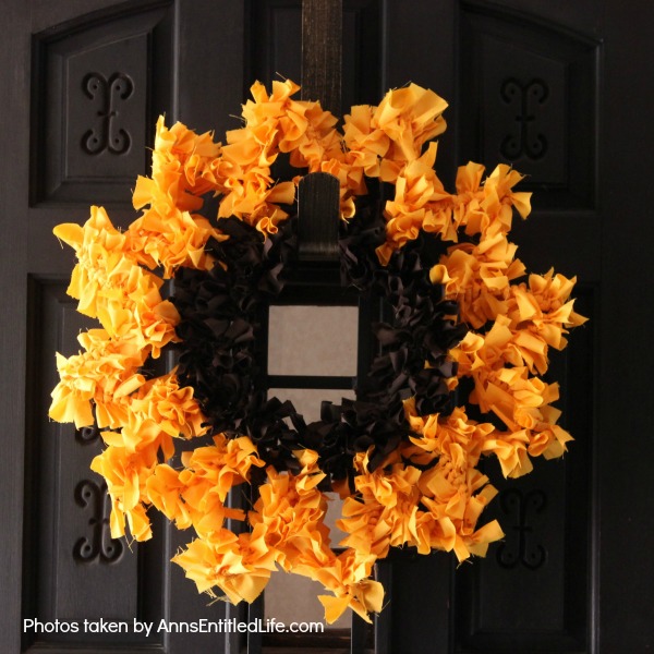 Sunflower Knot Wreath. This DIY tutorial on how to make a sunflower knot wreath has easy to follow, step-by-step instructions. An hour or so of your time results in this lovely sunflower knot wreath, perfect for your front door!