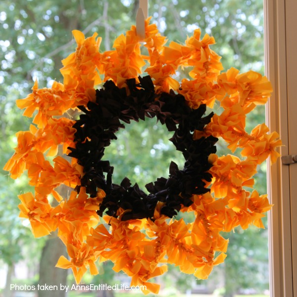 Sunflower Knot Wreath. This DIY tutorial on how to make a sunflower knot wreath has easy to follow, step-by-step instructions. An hour or so of your time results in this lovely sunflower knot wreath, perfect for your front door!