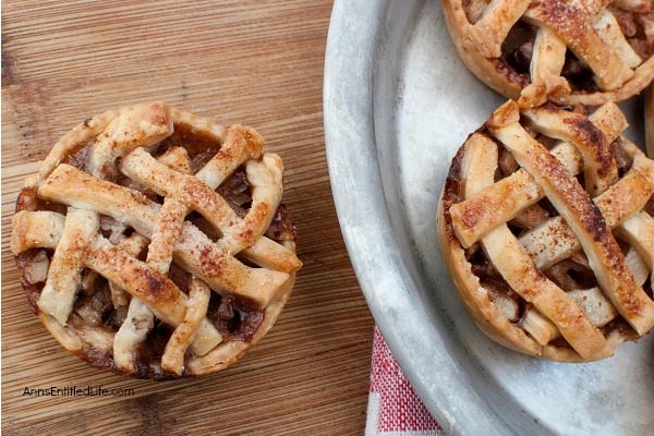 Baby Apple Walnut Pies Recipe. These simple, six-ingredient, baby apple walnut pies are fabulous! Easy to make, these Baby Apple Walnut Pies will impress your friends and family. A wonderful fall or winter dessert, these baby pies are a wonderful sweet treat.