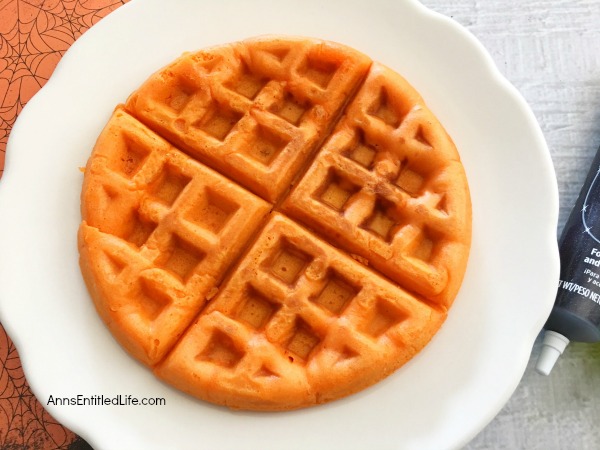 Jack-O'-Lantern Waffles Recipe. A fun fall breakfast, this Jack-O'-Lantern Waffles Recipe is easy to make and delicious! Your kids (and you) will start the day with a smile when you enjoy this sweet and charming morning repast.