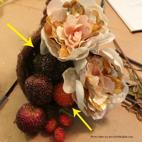 Floral Horn of Plenty DIY. This beautiful floral horn of plenty is a wonderful centerpiece or end table decorative piece, perfect for the fall season. A wonderful Thanksgiving decor accessory, this overflowing cornucopia is easy to make, and highly customizable.