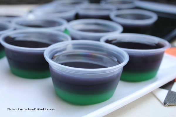 Purple People Eater Jello Shots Recipe. This Purple People Eater Jello Shot recipe is a taste of Halloween in a party shot! Simple to make, these Purple People Eater Jello Shots are great for parties, tailgating, and more!