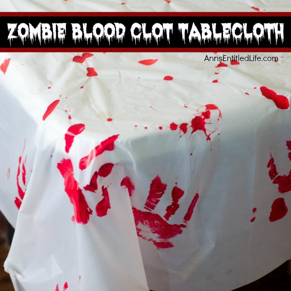 Zombie Blood Clot Tablecloth. Instead of paying big bucks for a Halloween tablecloth, make this simple Zombie tablecloth. It adds a touch of spookiness to your Halloween party table. Five minutes, plus dry time, and your Halloween table has a spooktacular covering!