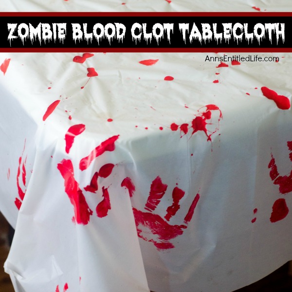 Zombie Blood Clot Tablecloth. Instead of paying big bucks for a Halloween tablecloth, make this simple Zombie tablecloth. It adds a touch of spooky to your Halloween party table. Five minutes, plus dry time, and your Halloween table has a spooktacular covering!