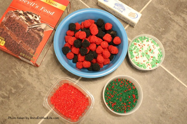 Chocolate Raspberry Truffle Bites Recipe. These simple to make chocolate truffles come with a fun raspberry surprise inside! A fun addition to your holiday cookie platter, this Chocolate Raspberry Truffle Bites Recipe is truly tasty.