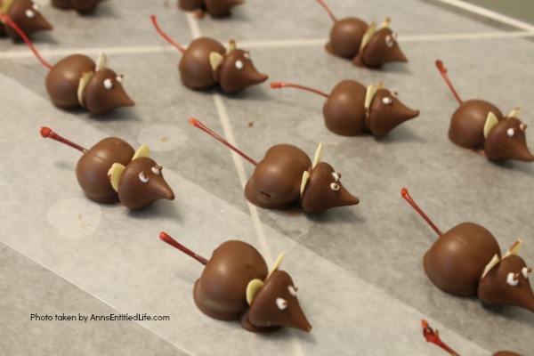 Boozy Chocolate Christmas Mice. These Manhattan-inspired (that is the cocktail, not the place) boozy chocolate Christmas mice are fun and tasty. Place a few to nibble along your Christmas cookie platters!