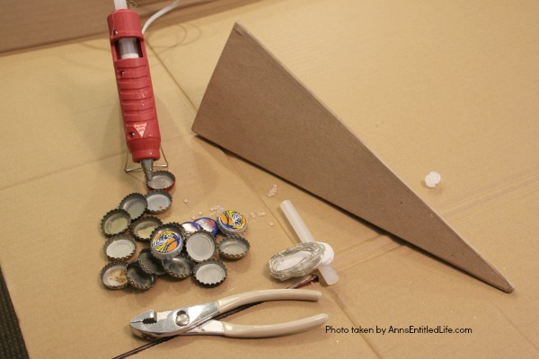 Bottle Cap Christmas Tree DIY Tutorial. Follow the step by step instructions in this Bottle Cap Christmas Tree DIY Tutorial to make a lighted bottle cap Christmas tree. Use your pop caps or beer caps to make this unique, and beautiful, holiday craft!