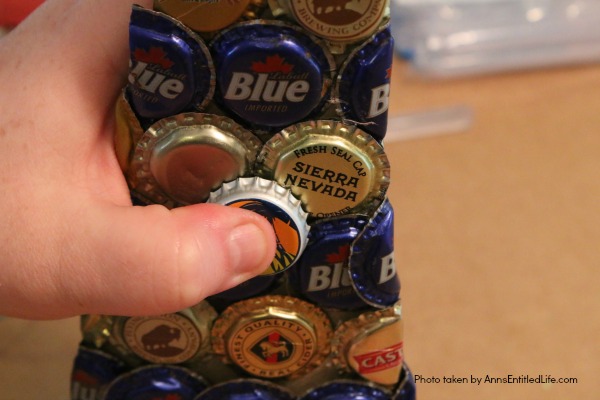 Bottle Cap Christmas Tree DIY Tutorial. Follow the step by step instructions in this Bottle Cap Christmas Tree DIY Tutorial to make a lighted bottle cap Christmas tree. Use your pop caps or beer caps to make this unique, and beautiful, holiday craft!