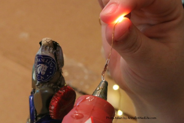 Bottle Cap Christmas Tree DIY Tutorial. Follow the step by step instructions in this Bottle Cap Christmas Tree DIY Tutorial to make a lighted bottle cap Christmas tree. Use your pop caps or beer caps to make this unique, and beautiful, holiday craft!