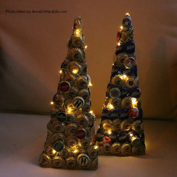 Bottle Cap Christmas Tree DIY Tutorial. Follow the step by step instructions in this Bottle Cap Christmas Tree DIY Tutorial to make a lighted bottle cap Christmas tree. Use your pop caps or beer caps to make this unique, and beautiful, holiday craft!