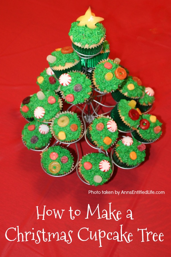 How to Make a Christmas Cupcake Tree. This simple step by step tutorial will help you put together this wonderful Christmas cupcake display. Great as a holiday party dessert display, for a centerpiece at the children's table, or for a Christmas buffet, this Christmas cupcake display is easy to put together and oh so cute!