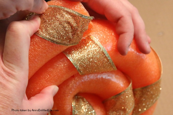 Pool Noodle Candy DIY Tutorial. This is a fast and easy to make 15 minute craft, perfect for indoor or outdoor holiday decorating. These low-cost pool noodle candy can be made in any color, so fully customizable to match your decorating color scheme!