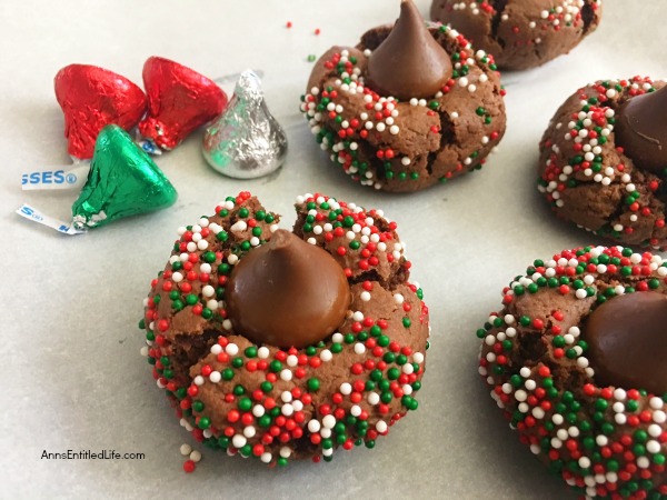 Double Chocolate Blossom Cookies Recipe. Twice the chocolaty goodness in these Double Chocolate Blossom Cookies! Update your holiday cookie recipes to include these easy to make, delicious, chocolate blossom cookies. Yum!