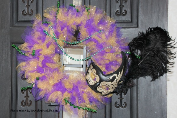 Glitter Mardi Gras Mask Wreath Tutorial. Follow the step by step instructions of this Glitter Mardi Gras Mask Wreath Tutorial to make this beautiful, sparkly, Mardi Gras Wreath. This highly customizable, simple to make, Glitter Mardi Gras Mask Wreath will look great on your front door, over your mantel, or on a wall. Truly unique Mardi Gras decor!