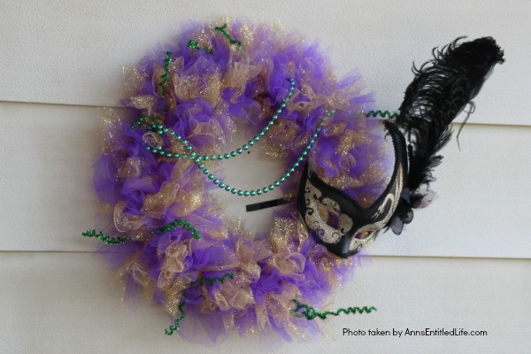 Glitter Mardi Gras Mask Wreath Tutorial. Follow the step by step instructions of this Glitter Mardi Gras Mask Wreath Tutorial to make this beautiful, sparkly, Mardi Gras Wreath. This highly customizable, simple to make, Glitter Mardi Gras Mask Wreath will look great on your front door, over your mantel, or on a wall. Truly unique Mardi Gras decor!