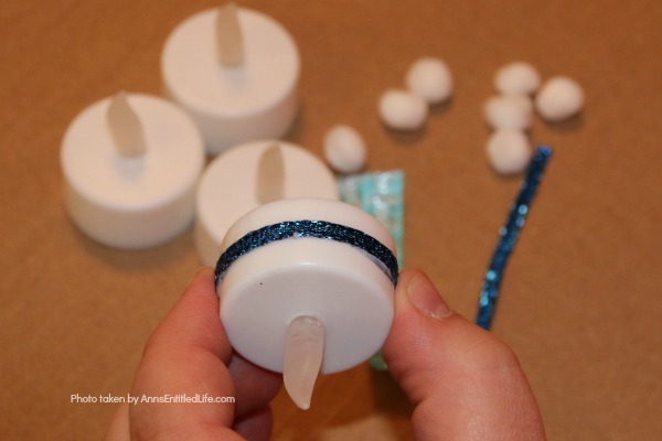 Easy Snowman Tealights Craft. These cute little snowman tealights are simple to make, and wonderful decor for the winter months. This 15-minute-craft is simple to make, and come together quickly! 