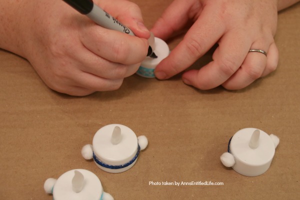 Easy Snowman Tealights Craft. These cute little snowman tealights are simple to make, and wonderful decor for the winter months. This 15-minute-craft is simple to make, and come together quickly! 