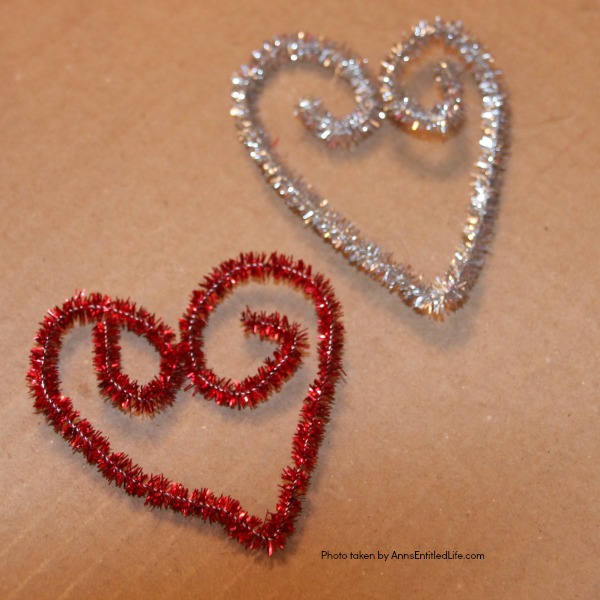 Dollar Store Craft: Heart Wreath. This simple to make heart wreath is made using dollar store finds. It comes together in under 15 minutes, and it a wonderful, inexpensive heart décor. Perfect for Valentine’s Day, Sweetest Day, or any occasion where heart décor is wanted.