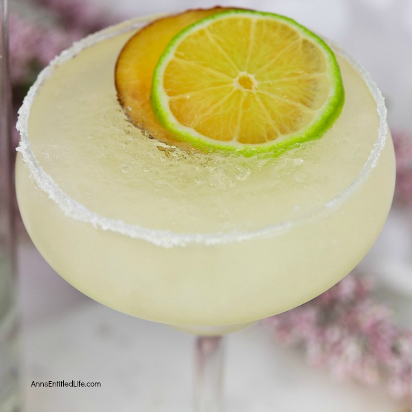 Peach Margarita Recipe. Warm summer evenings are perfectly suited to a delicious, cool libation. This Peach Margarita is just the drink for the occasion. On the rocks, this Peach Margarita Recipe is exquisitely sweet, refreshing and potent!